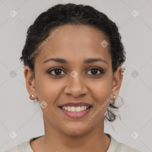 Joyful latino young-adult female with short  brown hair and brown eyes