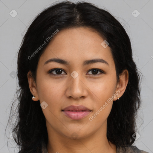 Joyful latino young-adult female with long  black hair and brown eyes