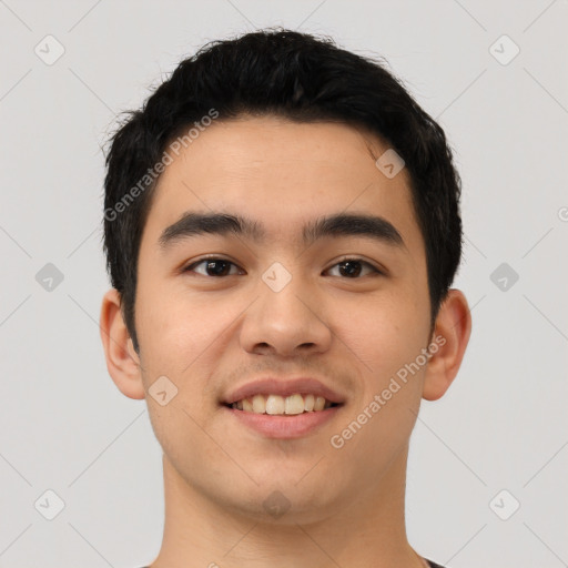 Joyful asian young-adult male with short  black hair and brown eyes