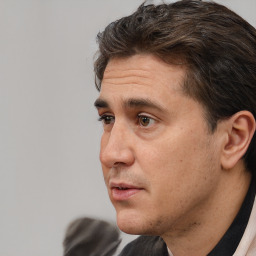 Neutral white adult male with short  brown hair and brown eyes