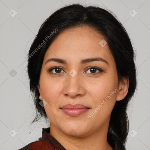 Joyful latino adult female with medium  brown hair and brown eyes