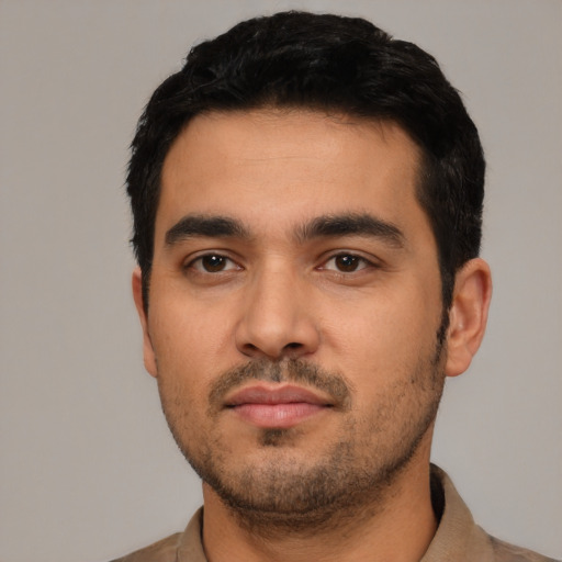 Neutral latino young-adult male with short  black hair and brown eyes