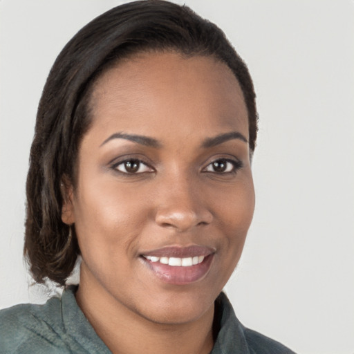 Joyful black young-adult female with medium  brown hair and brown eyes
