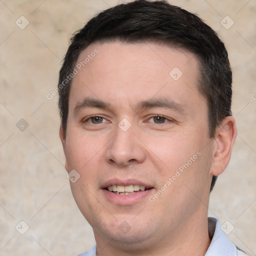 Joyful white young-adult male with short  black hair and brown eyes