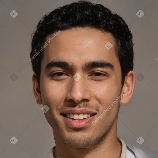 Joyful white young-adult male with short  black hair and brown eyes