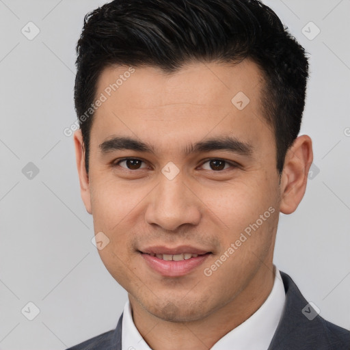 Joyful white young-adult male with short  black hair and brown eyes