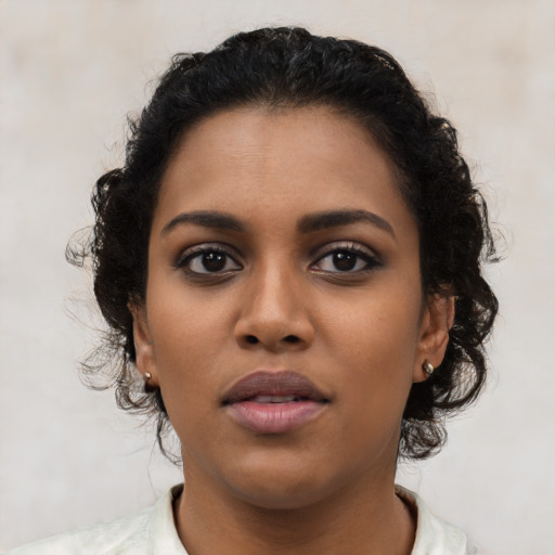 Neutral latino young-adult female with short  brown hair and brown eyes