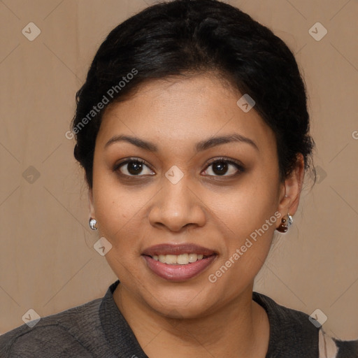 Joyful latino young-adult female with short  brown hair and brown eyes