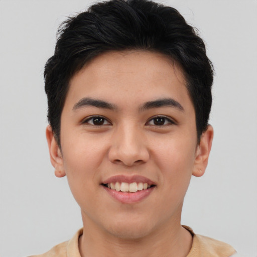 Joyful asian young-adult female with short  brown hair and brown eyes