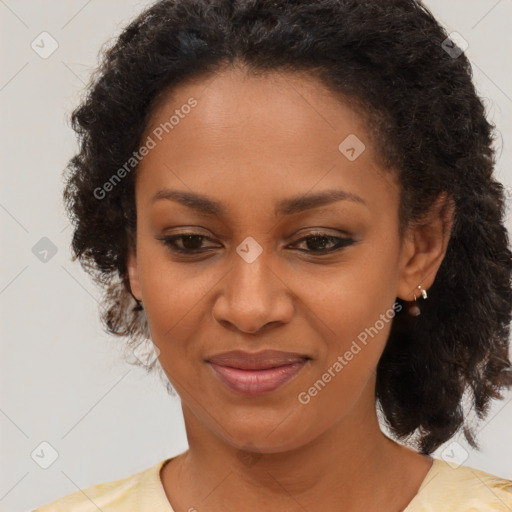 Joyful black young-adult female with medium  brown hair and brown eyes