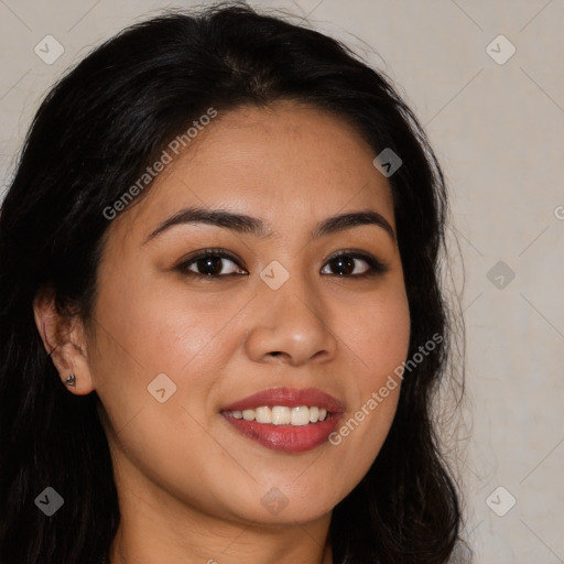 Joyful white young-adult female with long  brown hair and brown eyes