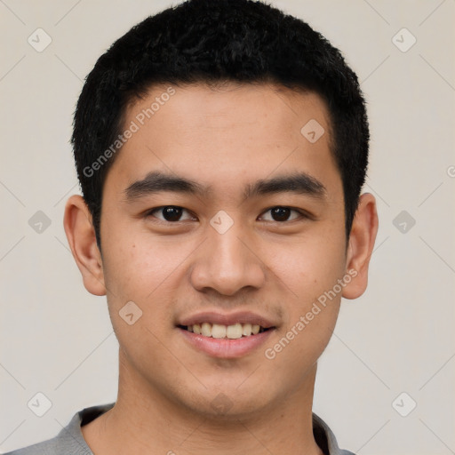 Joyful latino young-adult male with short  black hair and brown eyes