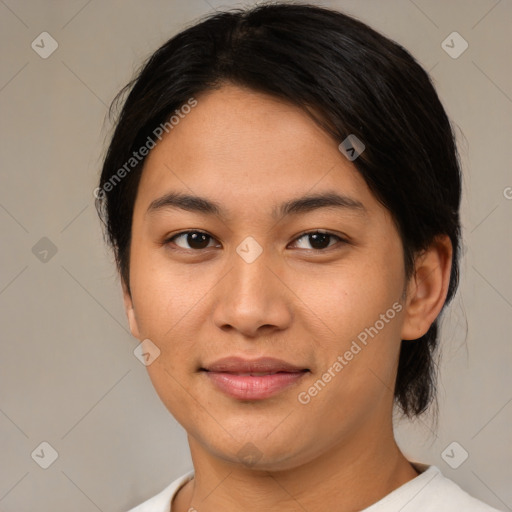 Joyful asian young-adult female with medium  brown hair and brown eyes