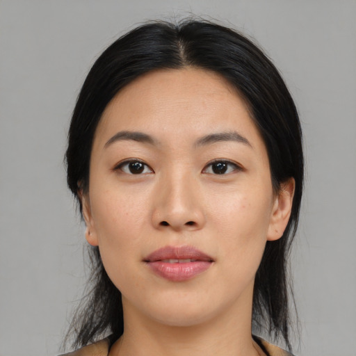 Neutral asian young-adult female with medium  black hair and brown eyes