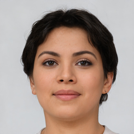 Joyful asian young-adult female with short  brown hair and brown eyes