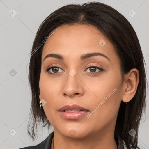 Joyful white young-adult female with long  brown hair and brown eyes