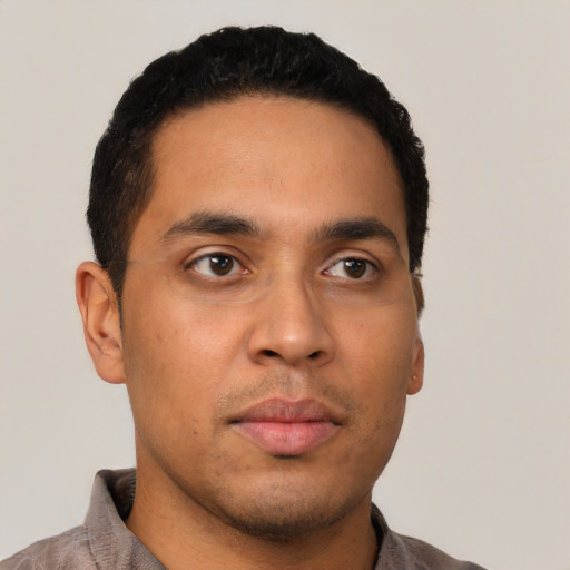 Neutral latino young-adult male with short  black hair and brown eyes