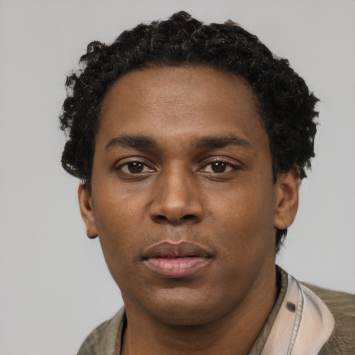 Neutral black young-adult male with short  black hair and brown eyes