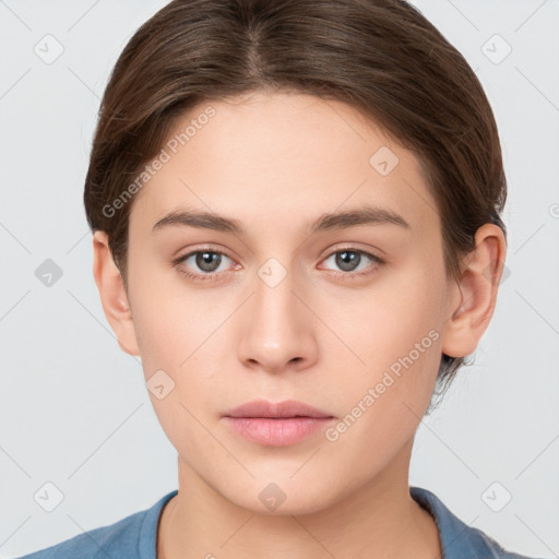 Neutral white young-adult female with short  brown hair and brown eyes