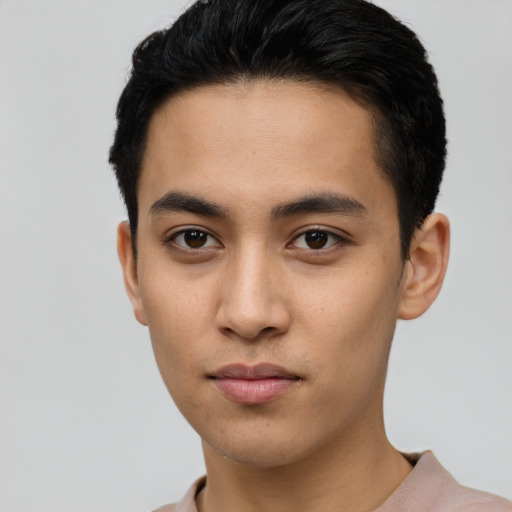 Neutral latino young-adult male with short  brown hair and brown eyes