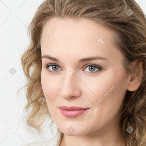 Joyful white young-adult female with medium  brown hair and green eyes