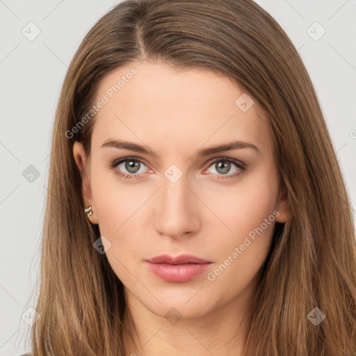 Neutral white young-adult female with long  brown hair and brown eyes