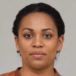 Neutral black young-adult female with short  brown hair and brown eyes