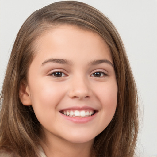 Joyful white child female with long  brown hair and brown eyes