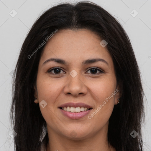 Joyful latino young-adult female with long  brown hair and brown eyes