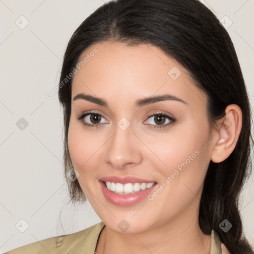 Joyful white young-adult female with long  brown hair and brown eyes