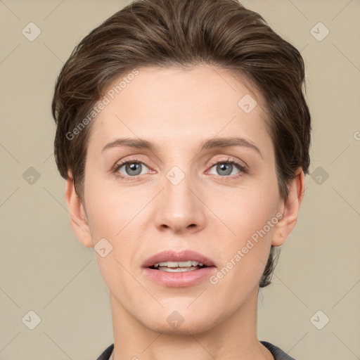 Joyful white young-adult female with short  brown hair and grey eyes