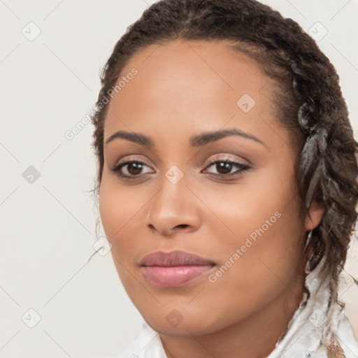 Joyful latino young-adult female with long  brown hair and brown eyes