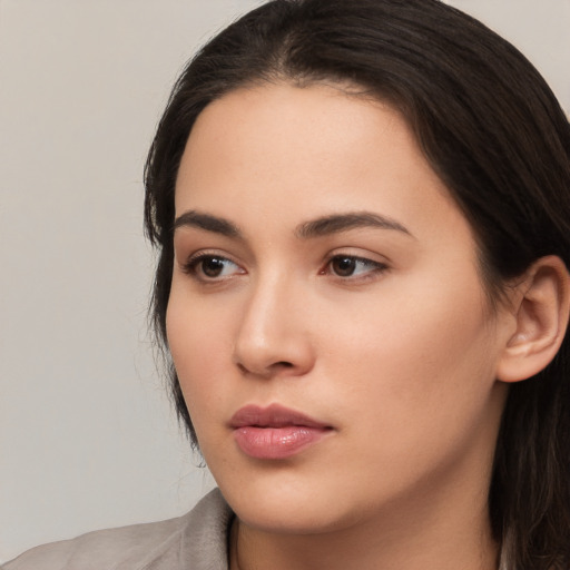 Neutral white young-adult female with long  black hair and brown eyes