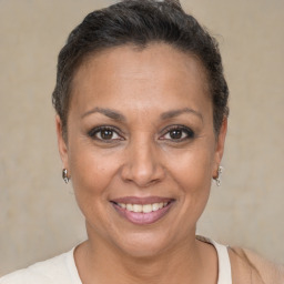 Joyful white adult female with short  brown hair and brown eyes