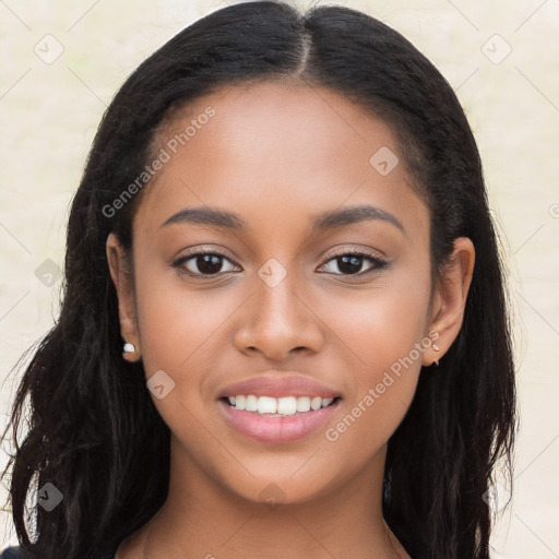 Joyful latino young-adult female with long  black hair and brown eyes