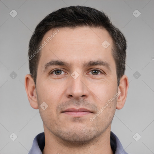 Neutral white young-adult male with short  brown hair and brown eyes