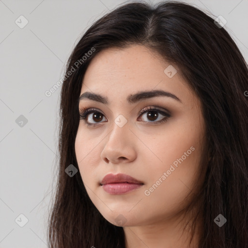 Neutral white young-adult female with long  brown hair and brown eyes