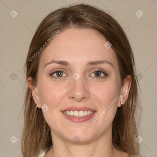 Joyful white young-adult female with long  brown hair and green eyes