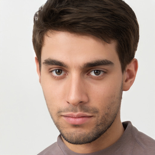 Neutral white young-adult male with short  brown hair and brown eyes