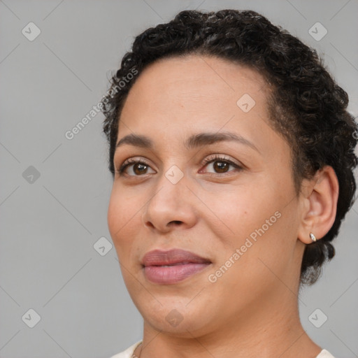 Joyful white adult female with short  brown hair and brown eyes