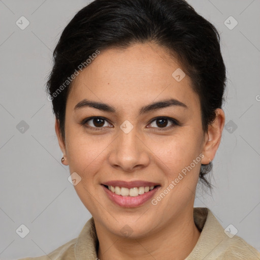 Joyful latino young-adult female with medium  brown hair and brown eyes