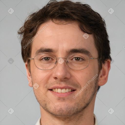 Joyful white adult male with short  brown hair and brown eyes