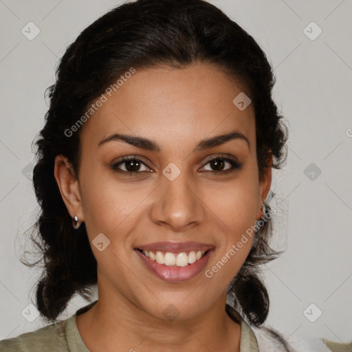 Joyful black young-adult female with medium  brown hair and brown eyes