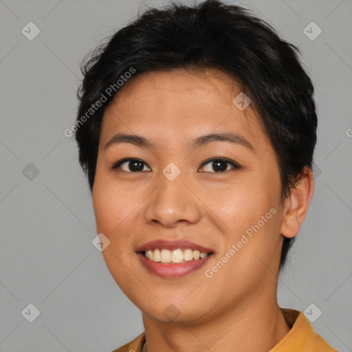 Joyful asian young-adult female with short  brown hair and brown eyes