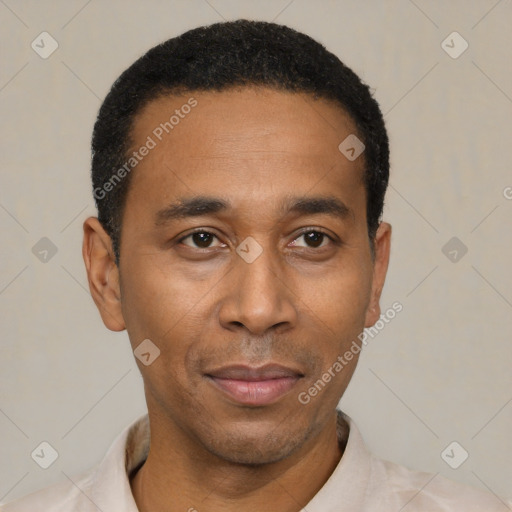 Joyful latino adult male with short  black hair and brown eyes