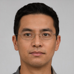 Neutral asian young-adult male with short  black hair and brown eyes