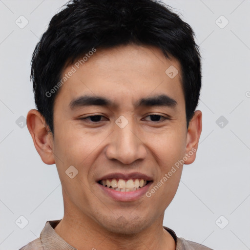 Joyful asian young-adult male with short  black hair and brown eyes