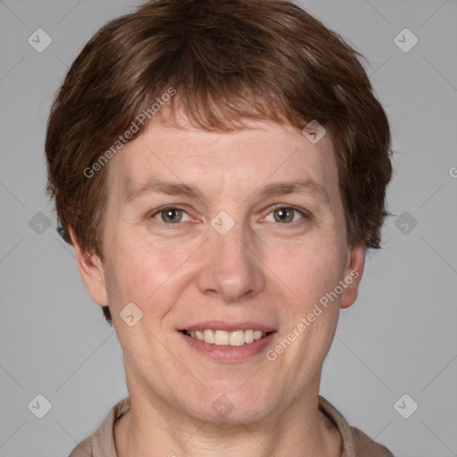 Joyful white adult male with short  brown hair and grey eyes