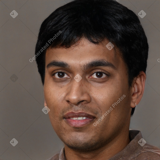 Joyful latino young-adult male with short  black hair and brown eyes
