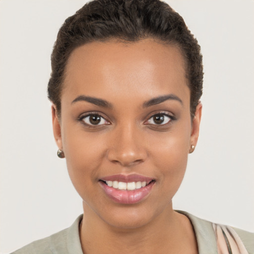 Joyful white young-adult female with short  brown hair and brown eyes